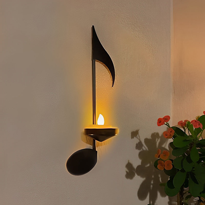 Candle holder with music notes