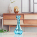 Handblown glass bud vase with fluted neck and weighted base