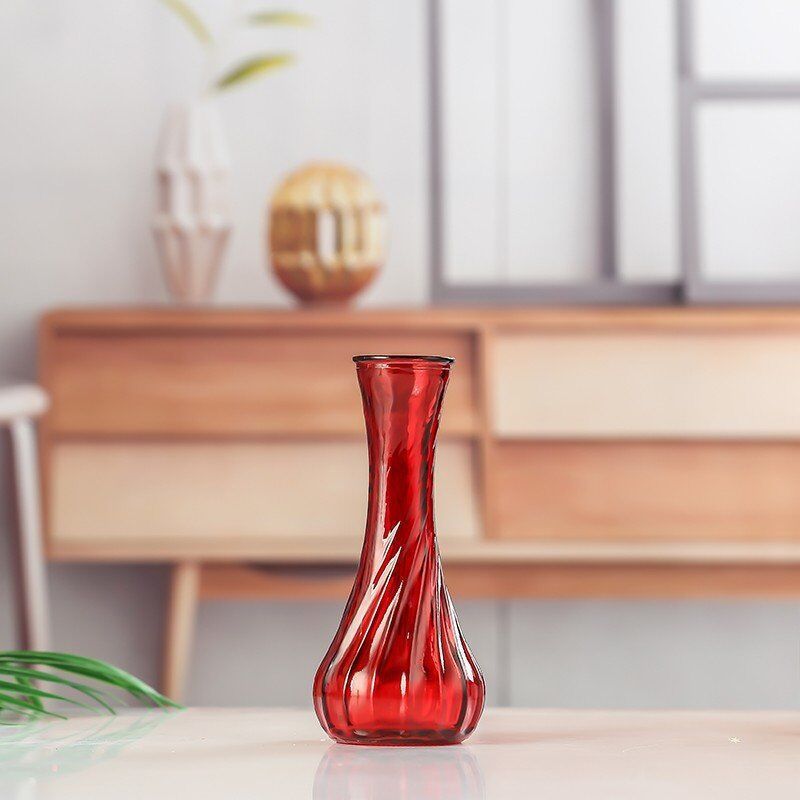 Handblown glass bud vase with fluted neck and weighted base