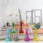 Handblown glass bud vase with fluted neck and weighted base