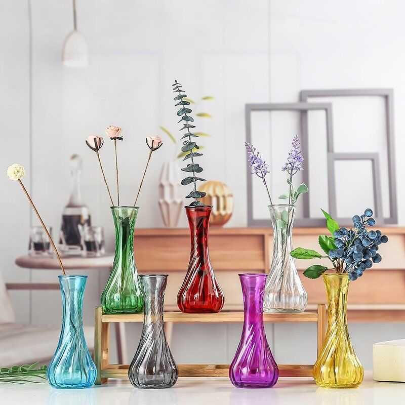 Handblown glass bud vase with fluted neck and weighted base