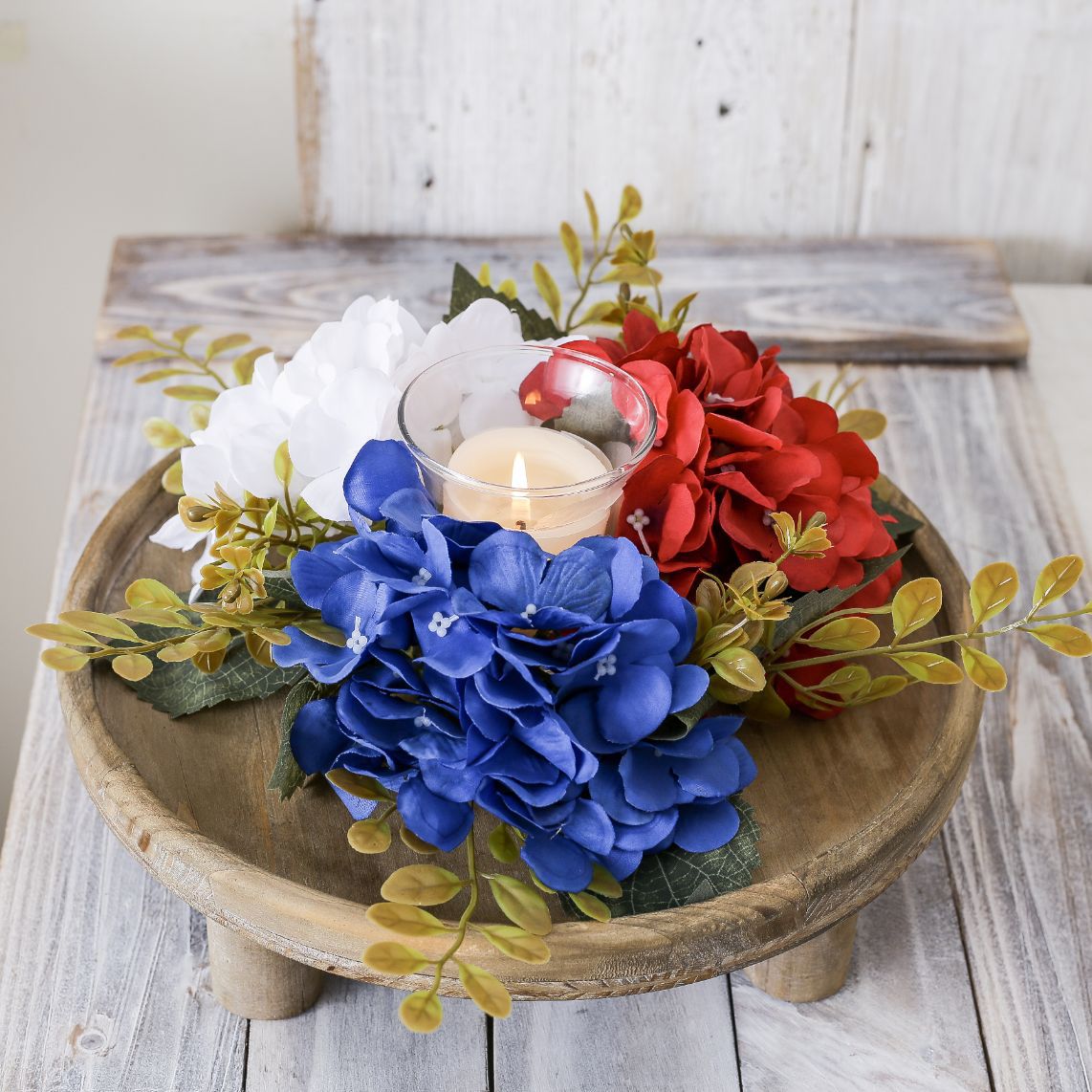 Unisex decorative candle plate with glass candle holder and artificial hydrangeas in country house style