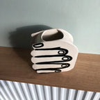 Hand Holding Flowers Vase